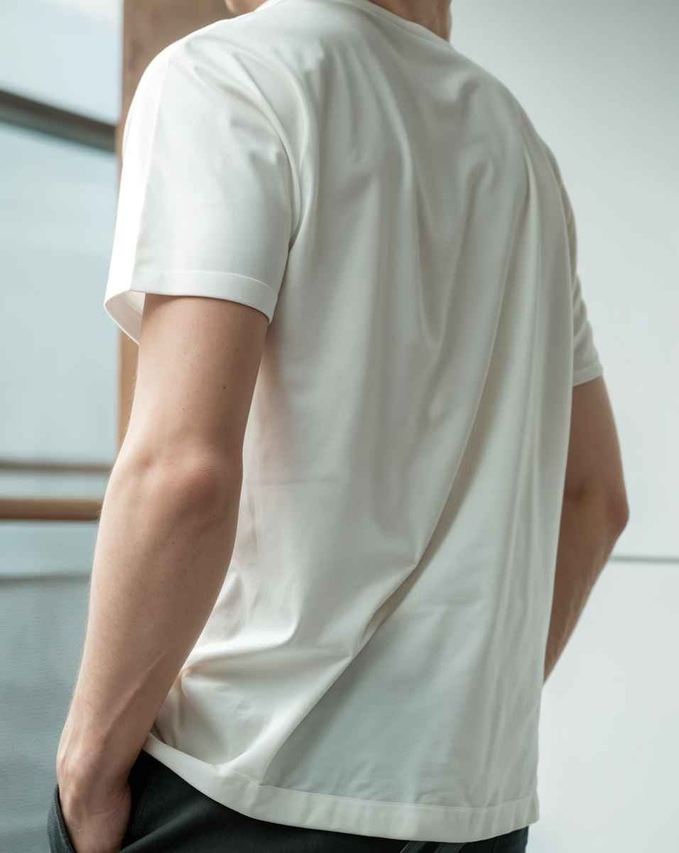 Back View of Person in White T-Shirt_11zon